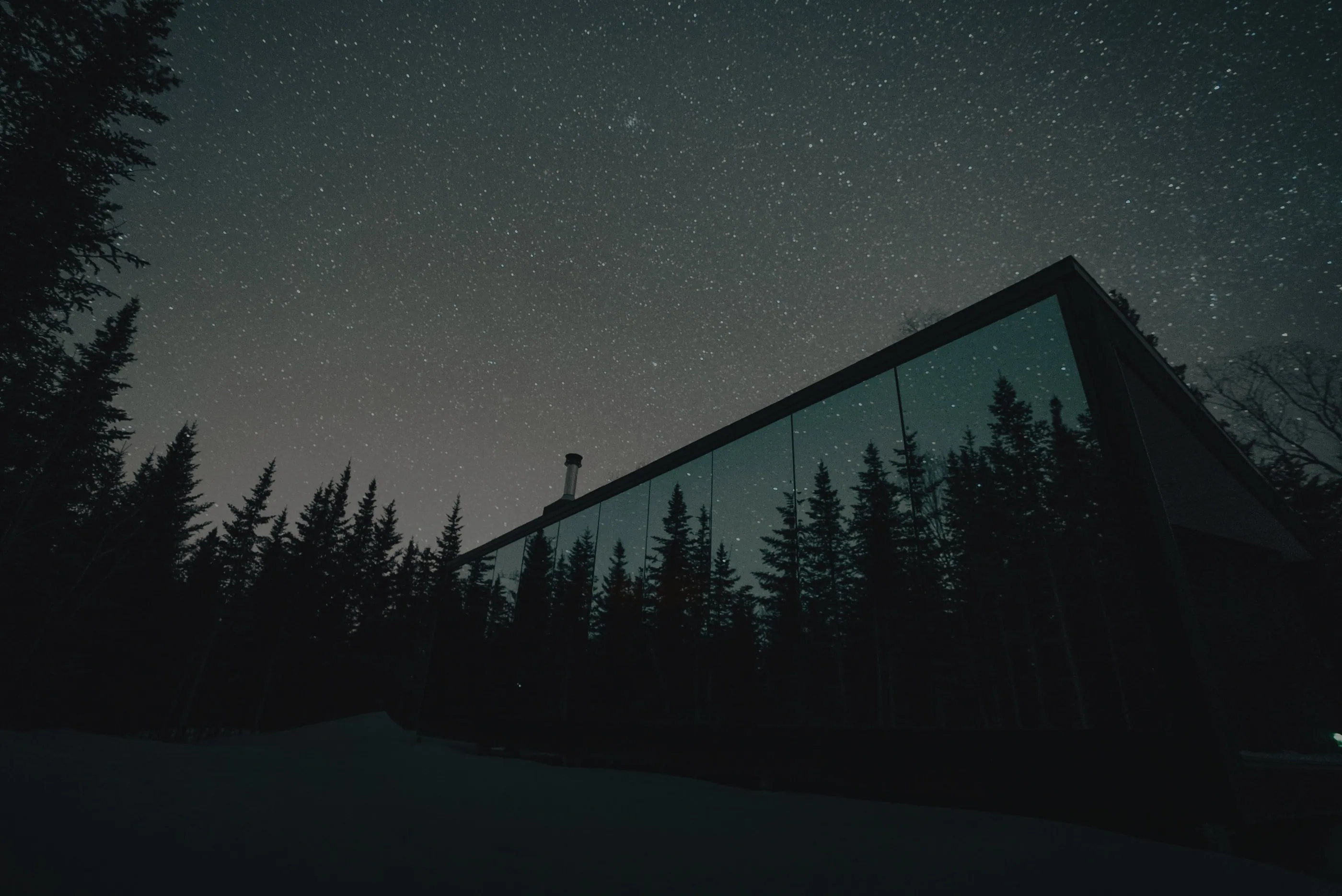 Une maison miroir de Réflexion sous les étoiles